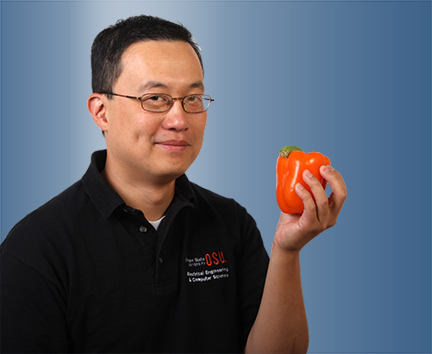 Weng-Keen Wong holding a pepper