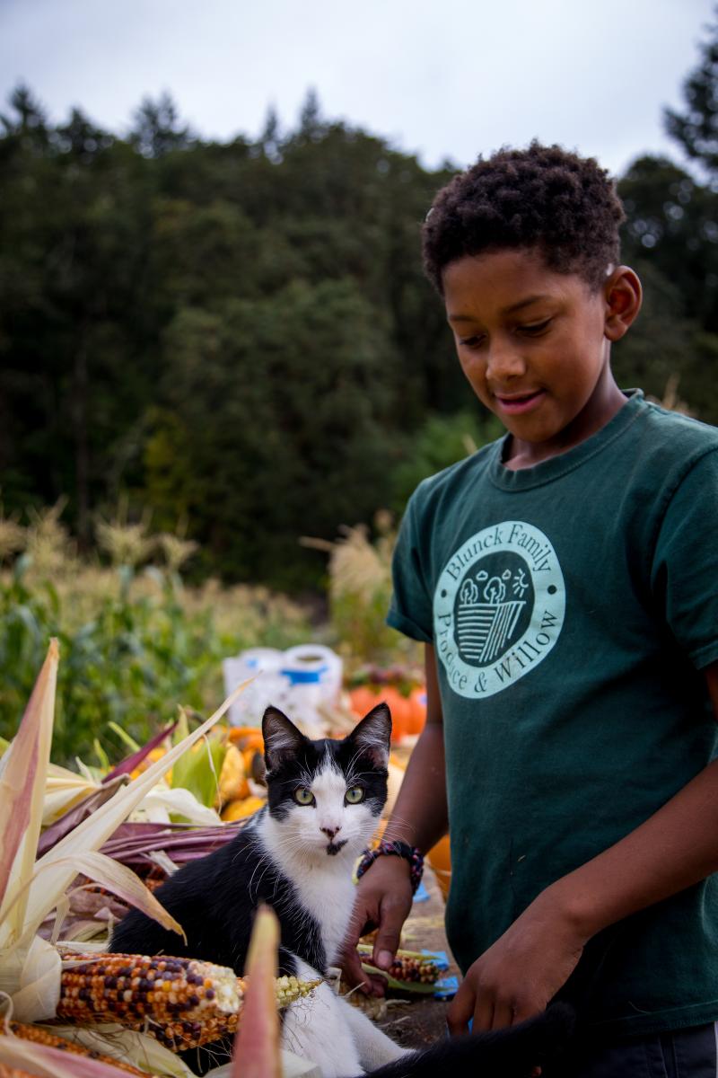  David Blunck's son and a cat.
