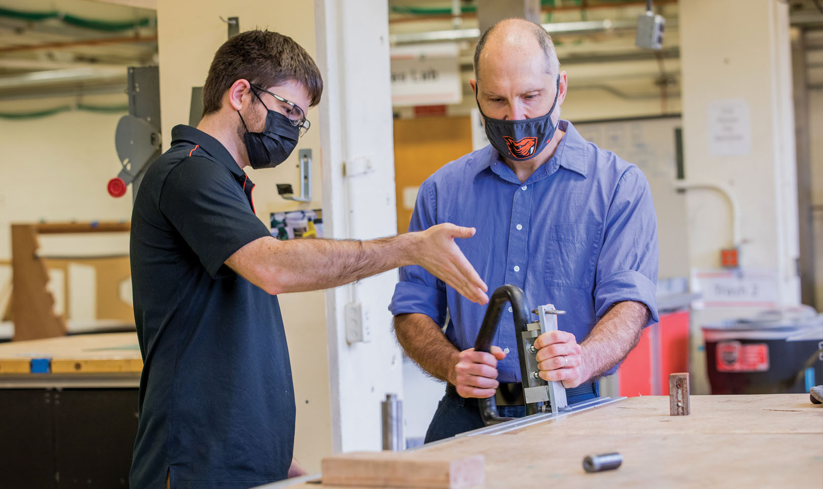 two faculty members working together