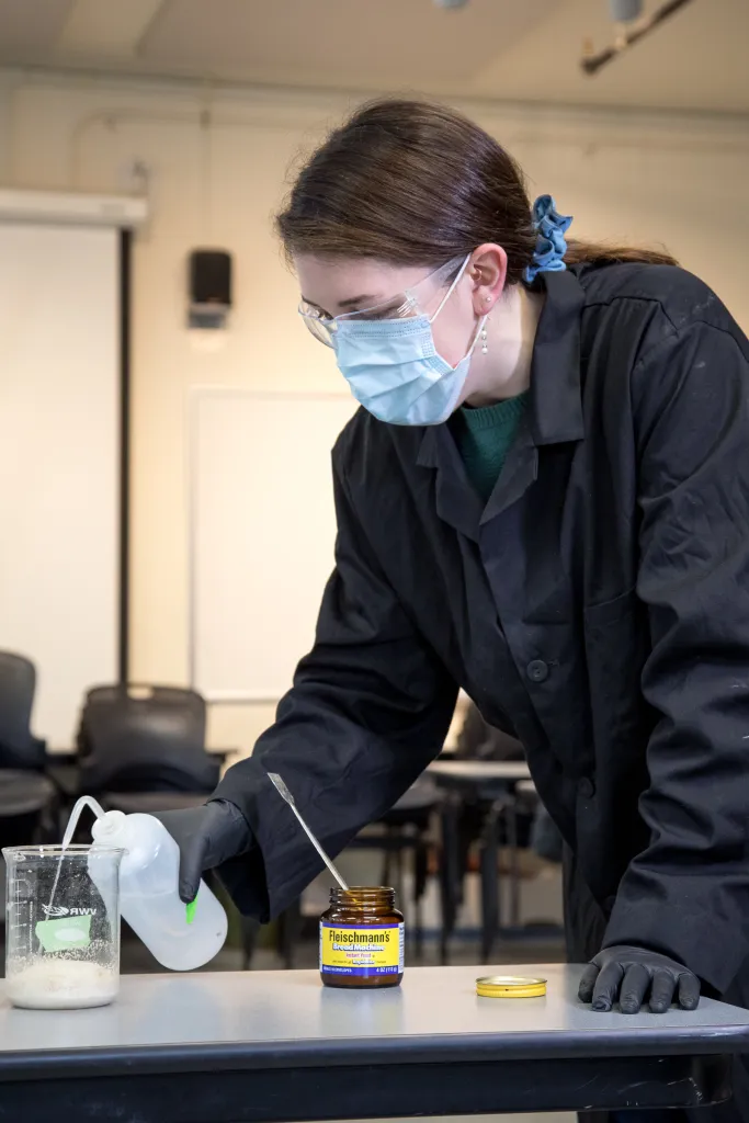 Lauren Lippman working on lab materials.