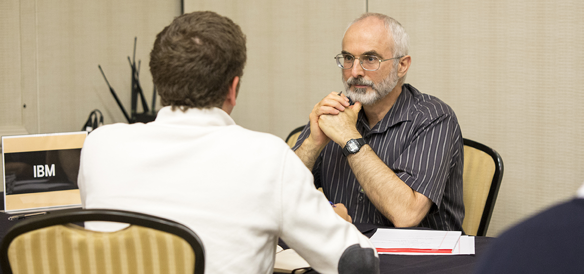 Paul McKenney engaged in a conversation.