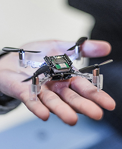 An unmanned aerial vehicle measuring 4cm x 4cm.
