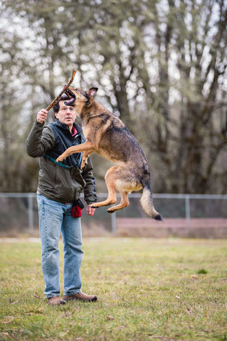 Steve Frandzel playing with his dog.