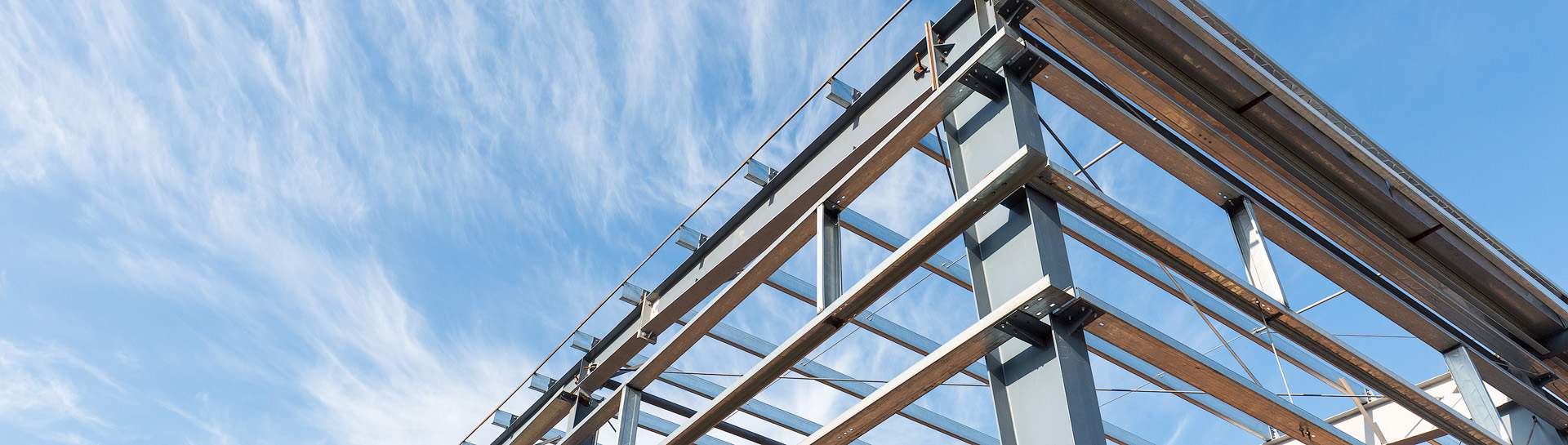 Metal structural beams on one side of a building.