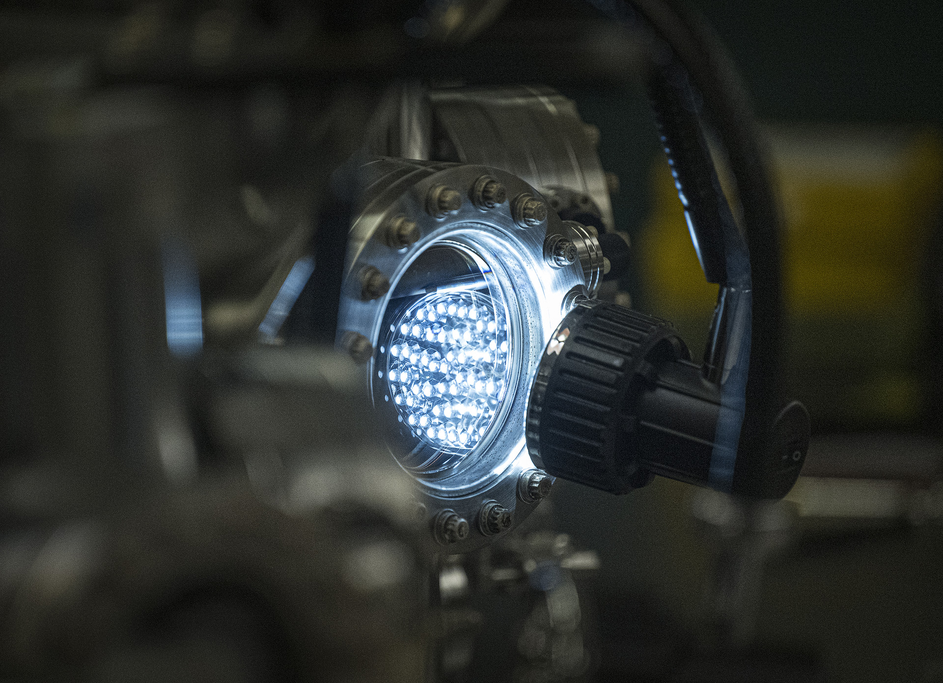 A bright light shining on a piece of unspecified lab equipment.