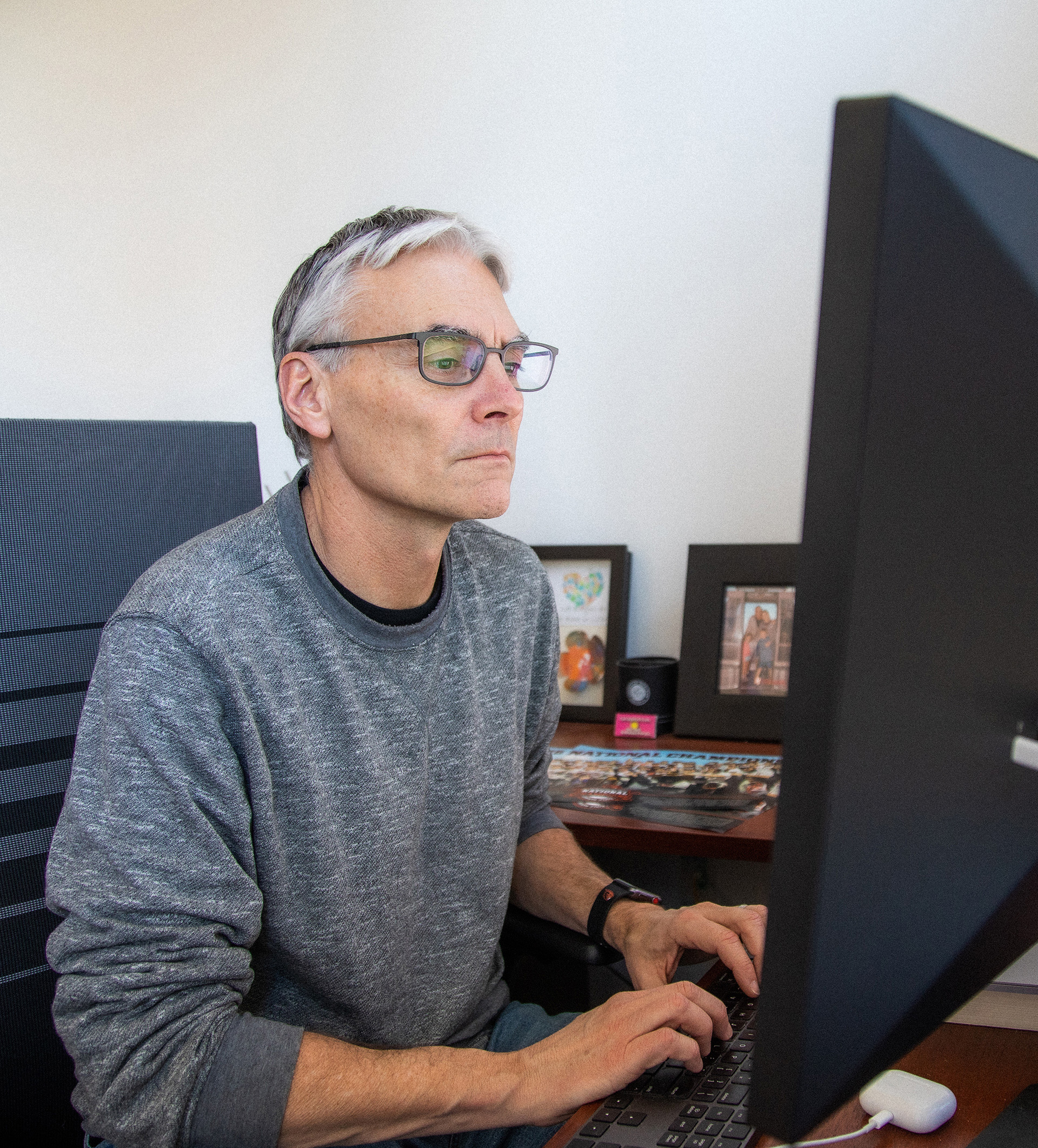 Nuclear engineering processor Todd Palmer using computer.