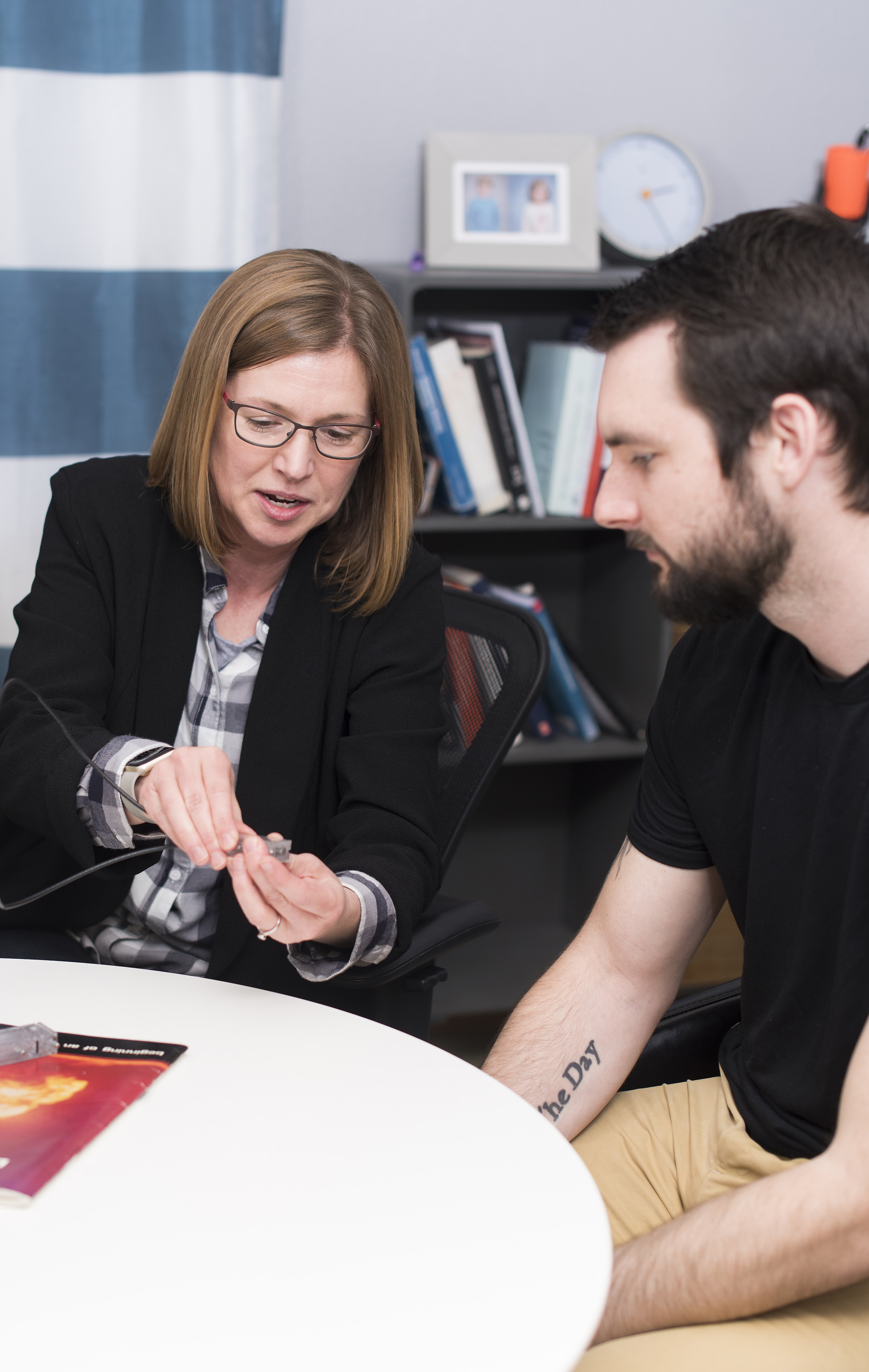 Camille Palmer, Nuclear Engineering professor, having a discussion with a student.