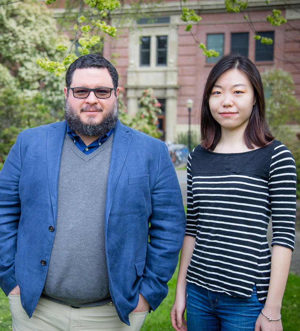 Industrial and Systems Engineering professor Javier Calvo Amodio posing with a graduate student for a photo.