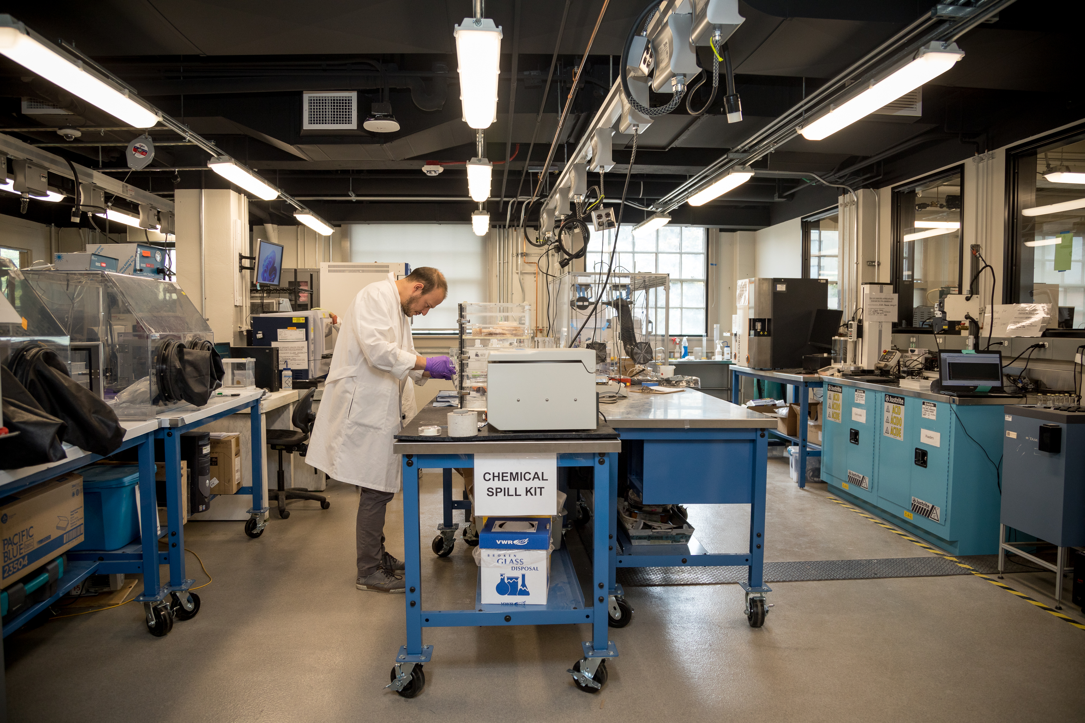 A man working in a lab.
