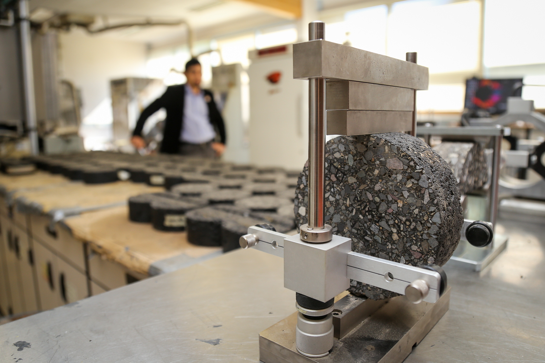 An instrument holding a rock.