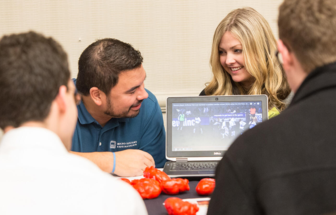 Company representatives talking with students