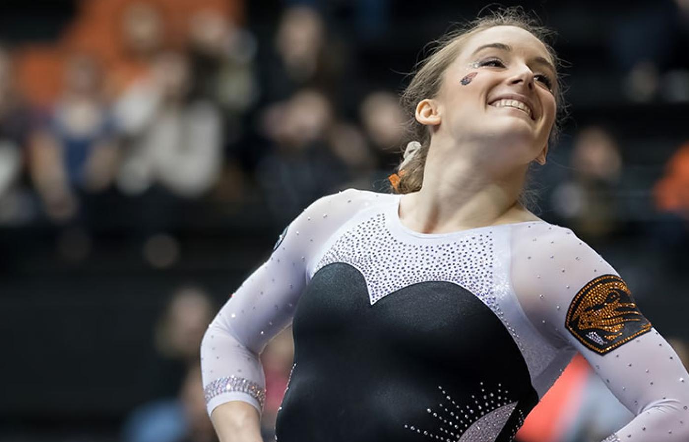 Mary Jacobsen performing gymnastics.