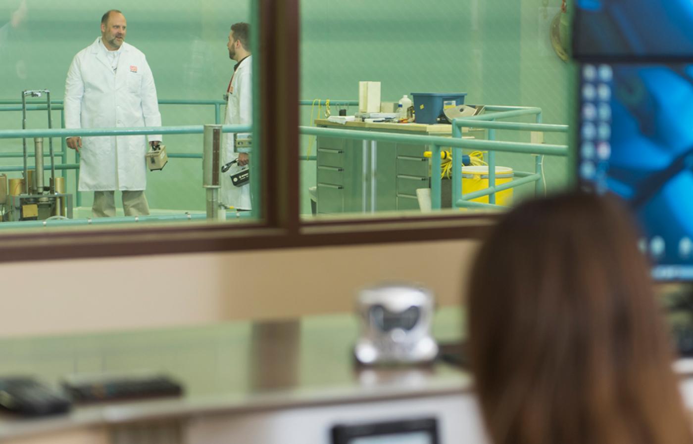 Steven Reese with researchers in the Oregon State Radiation Center.