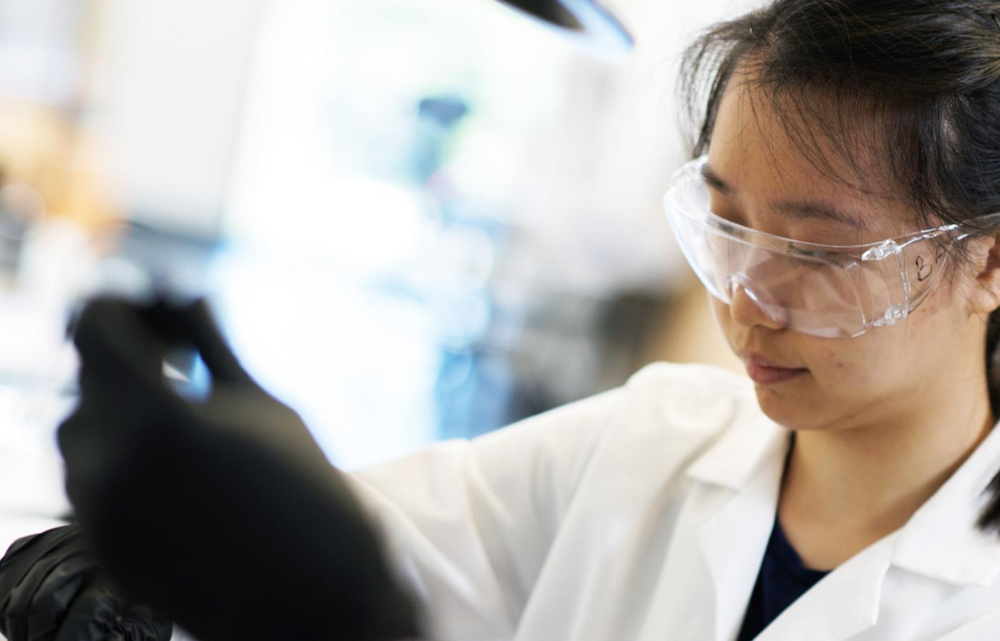 A person in lab conducting a research experiment.