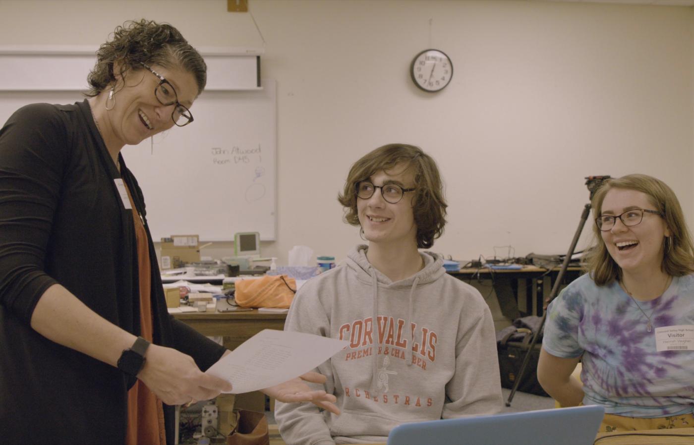 Professor teaching computer science concepts with Connect Four. 