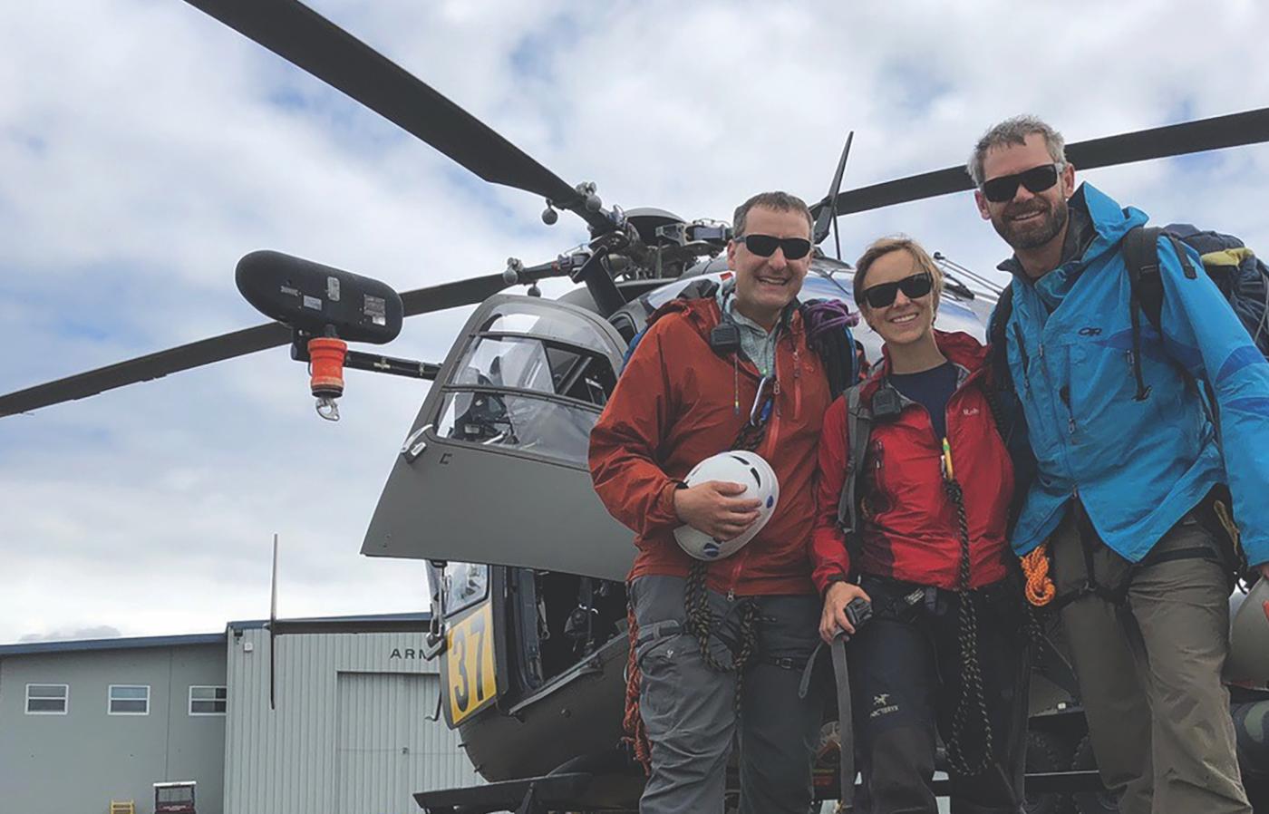 odd Shechter, Anna Pakenham Stevenson, and John Stevenson in front of an Oregon Army National Guard UH-72A Lakota Helicopter.