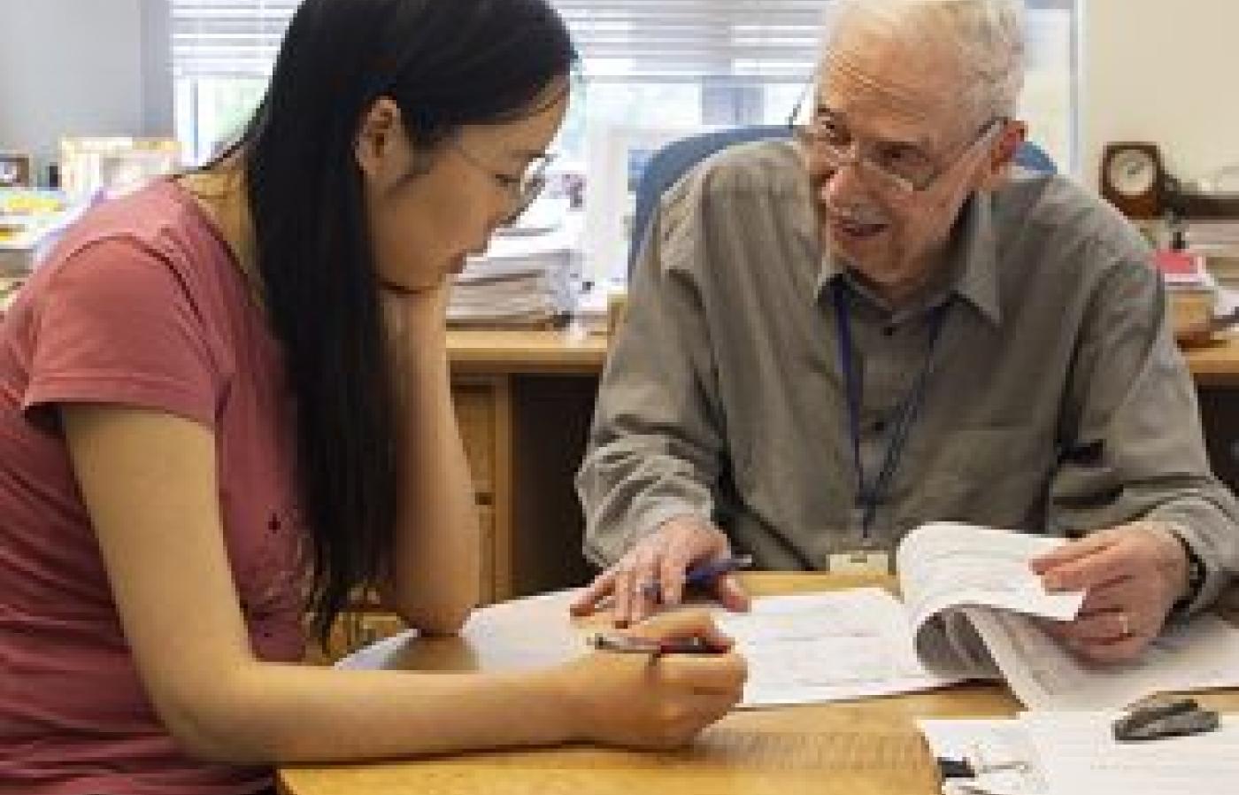 Gabor Temes (right) working with doctoral student Yanchao Wang.