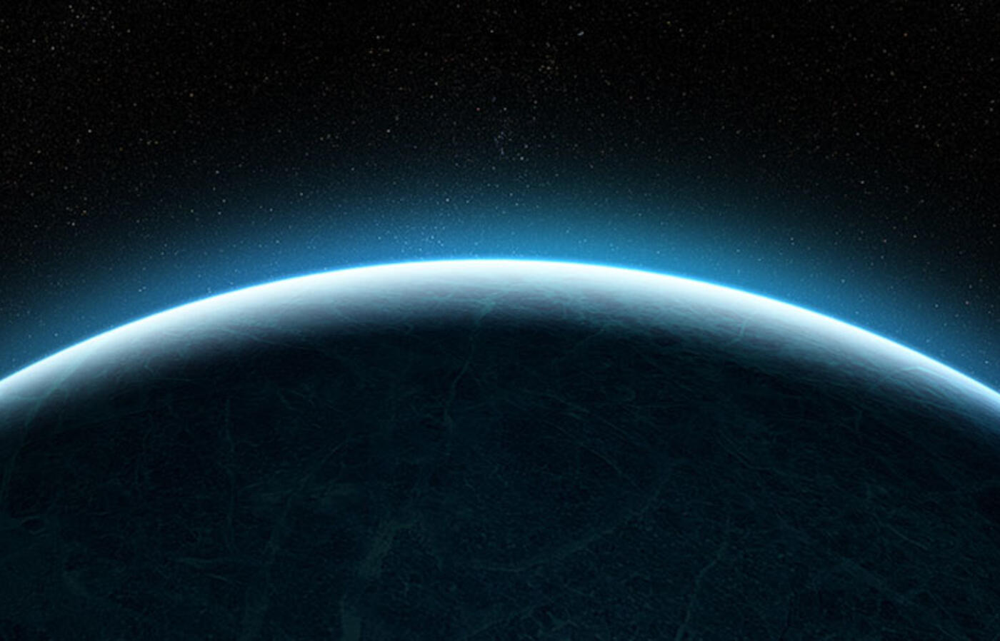 A rising planet in outer space with light shining on a ring-shaped edge and distant stars in the background.