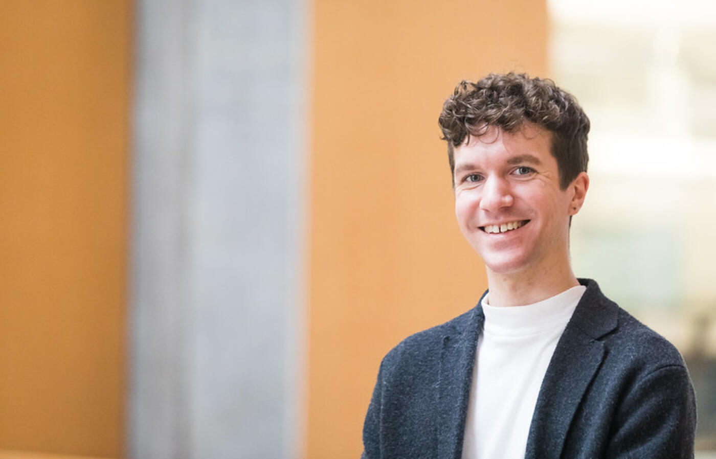 A person smiling at the camera.