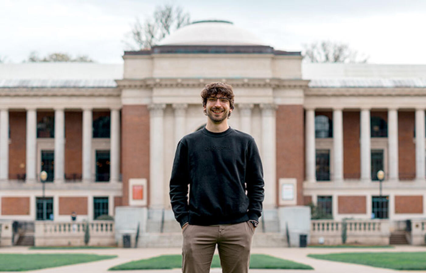 Noah Pragin poses in front of the Memorial Union.