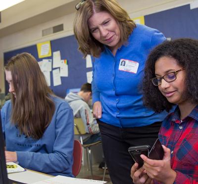 A picture of Jill Hubbard teaching a student.