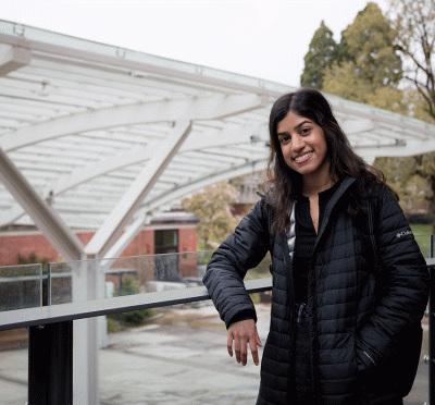 Subisha Sundaram at outdoor roof structure of the Student Experience Center