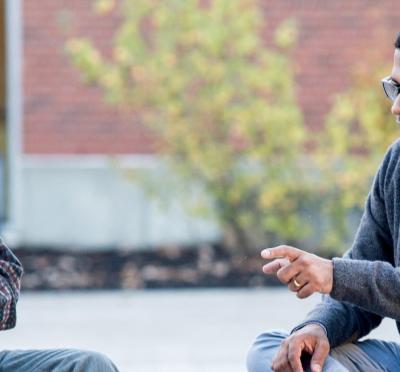 Prasad Tadepalli talking to a student.