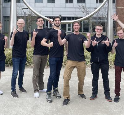 OSU Security Club members Jack Wright, Otso Barron, Brandon Ellis, Lucas Ball, Gabriel Kulp, Lyell Read, Casey Colley, Michael Carris Jr., and Robert Detjens celebrate a win after a cybersecurity competition.