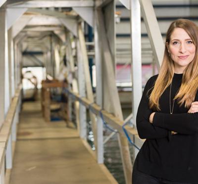 Associate Professor Bryony DuPont posing for a photo.