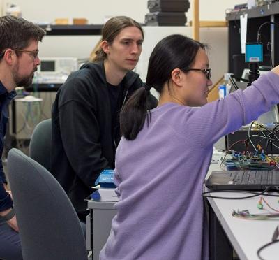 Matt Johnston and students in the lab