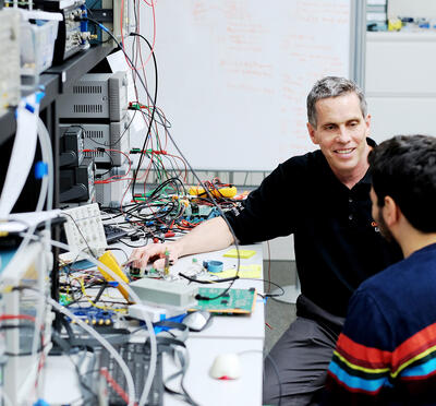 Tom Weller with student