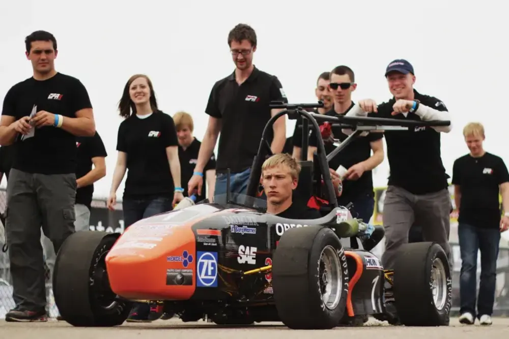 Global Formula Racing team, where Jill Lewis can be seen in the background.