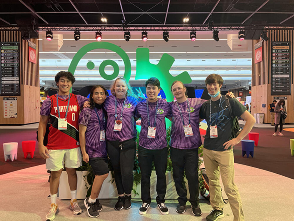 Shawn Kitagawa posing with his group of friends.