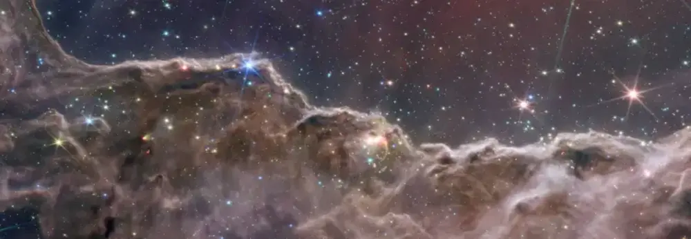 Segment of the Carina Nebula showcasing a resemblance to mountains and valleys.
