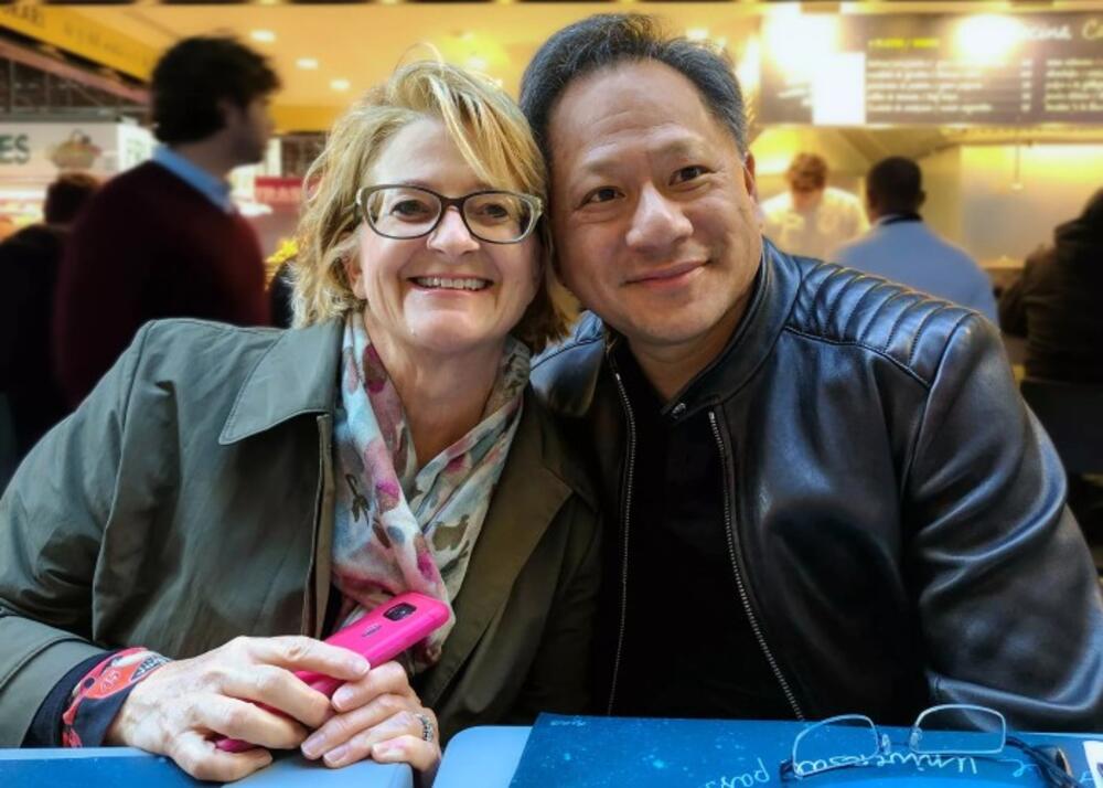 Lori and Jensen Huang.