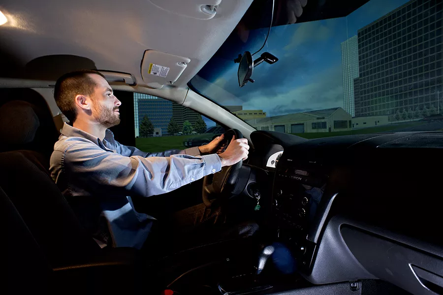 person in driving simulation
