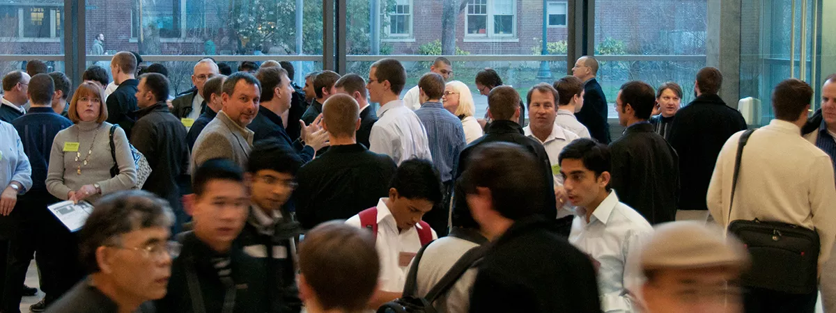 Students and industry representatives chat during a recruiting event at OSU