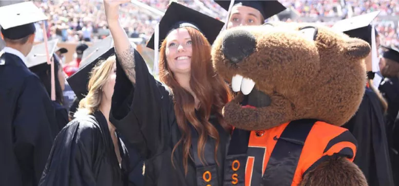 A group of students celebrating graduation.