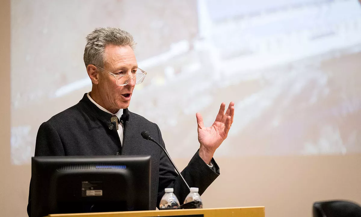 Mark Bransom presenting on stage during the dean’s distinguished lecture at Oregon State University.