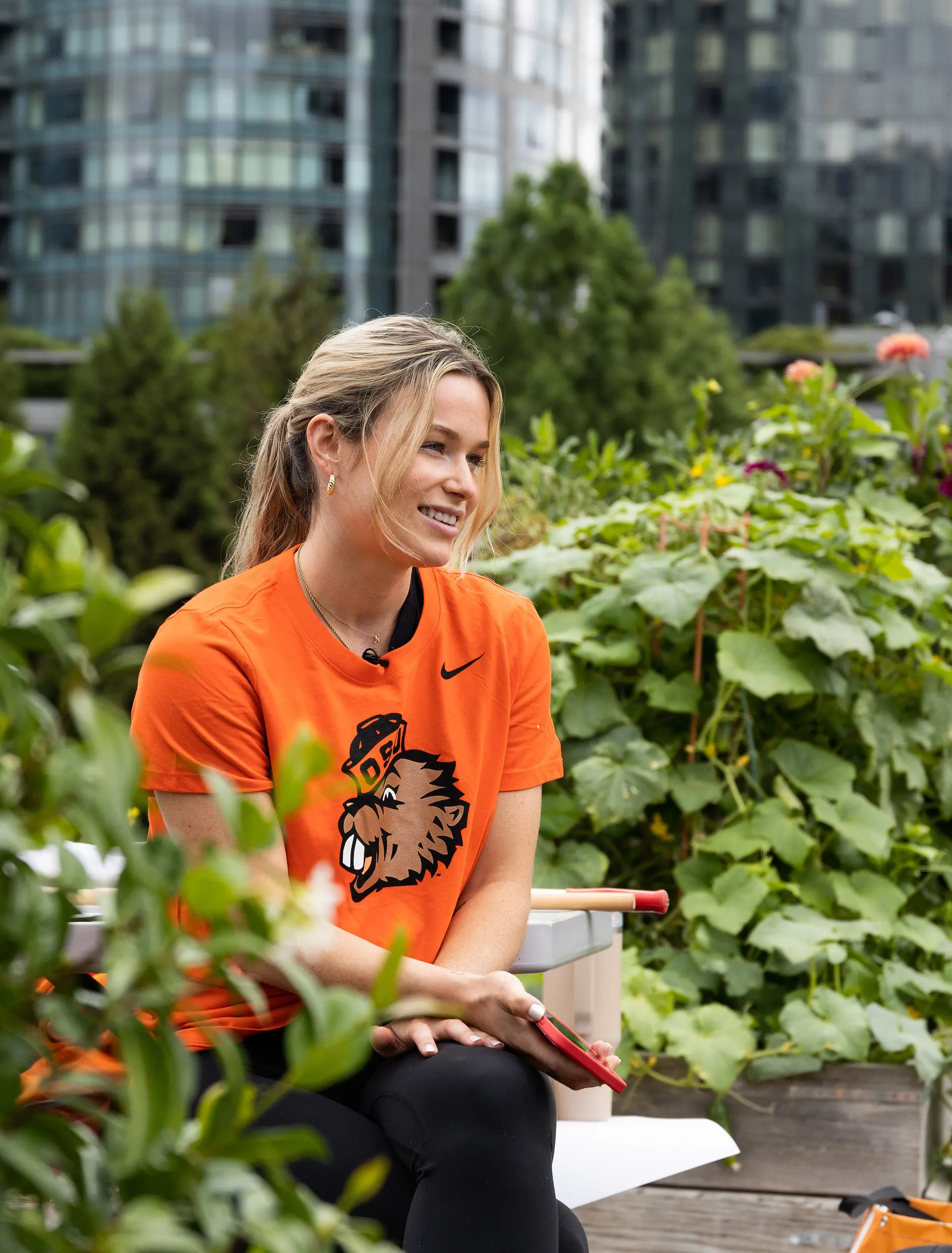 Person sitting in a garden.