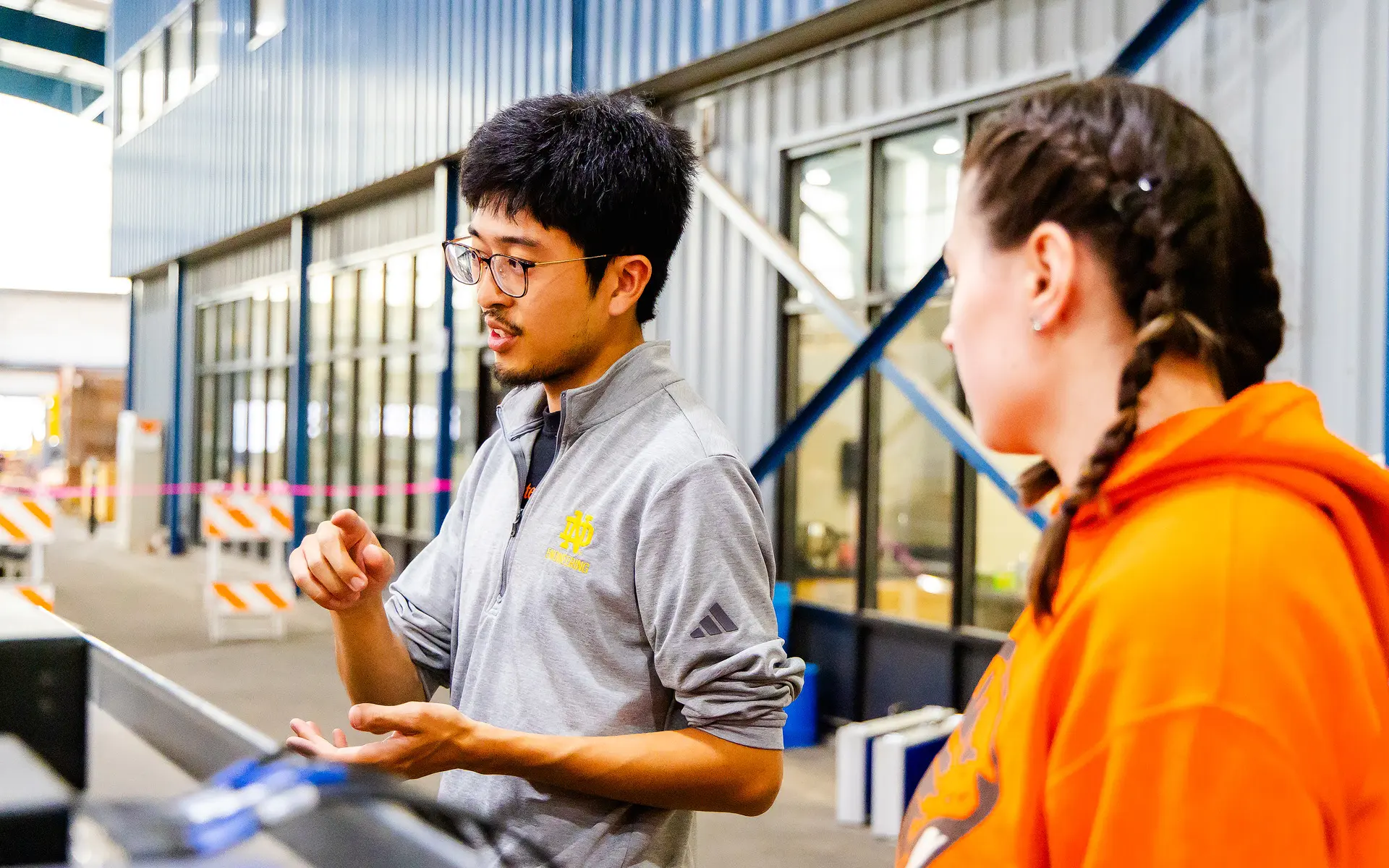 Two wave lab faculty in a discussion