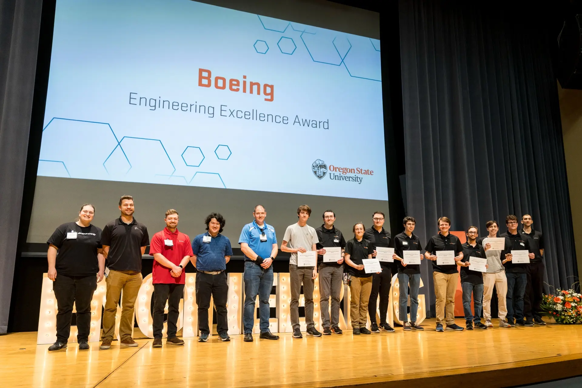 Students accept the 2025 Boeing Engineering Excellence award