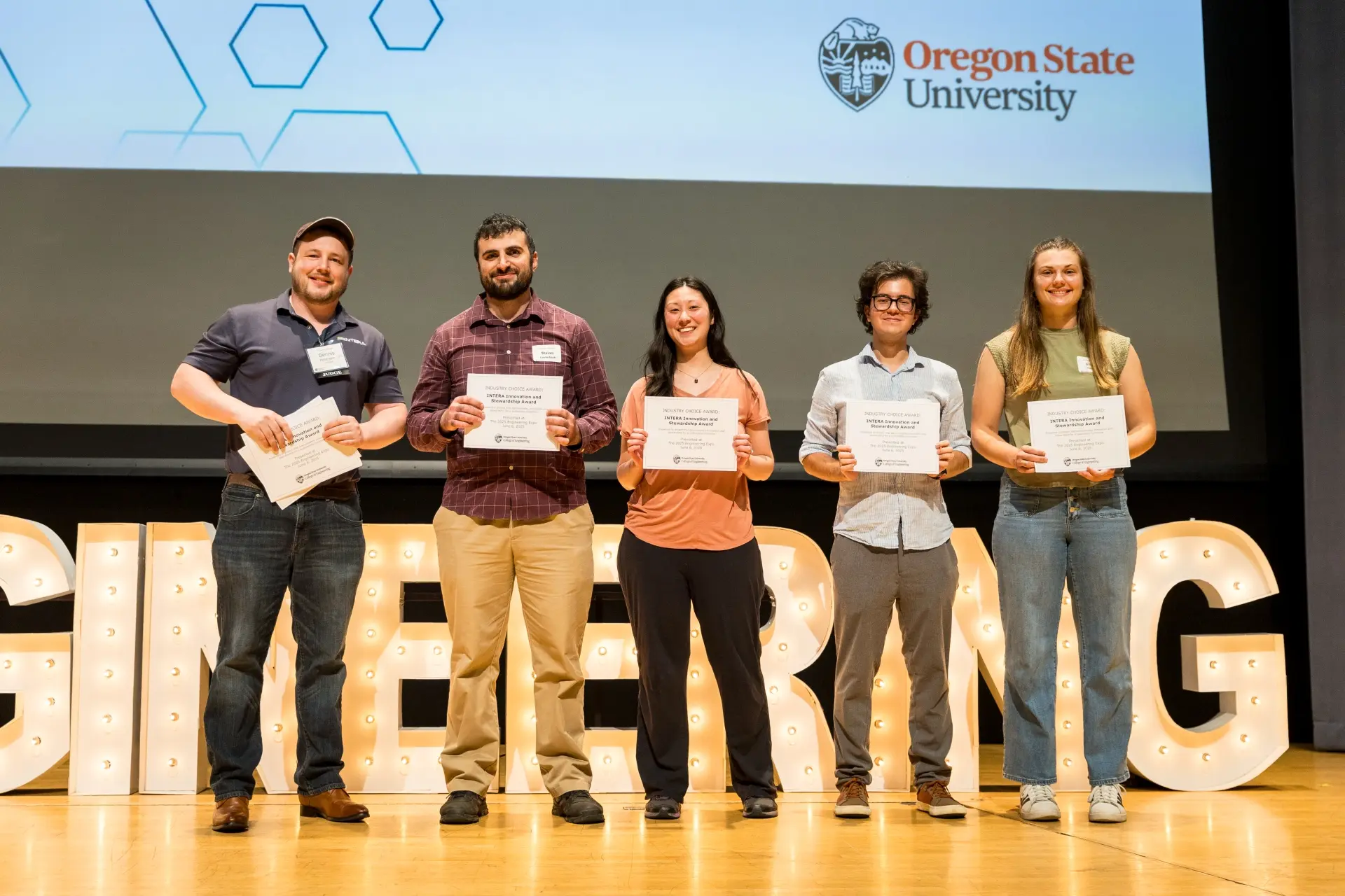 Students accept the 2025 INTERA Innovation and Stewardship Award