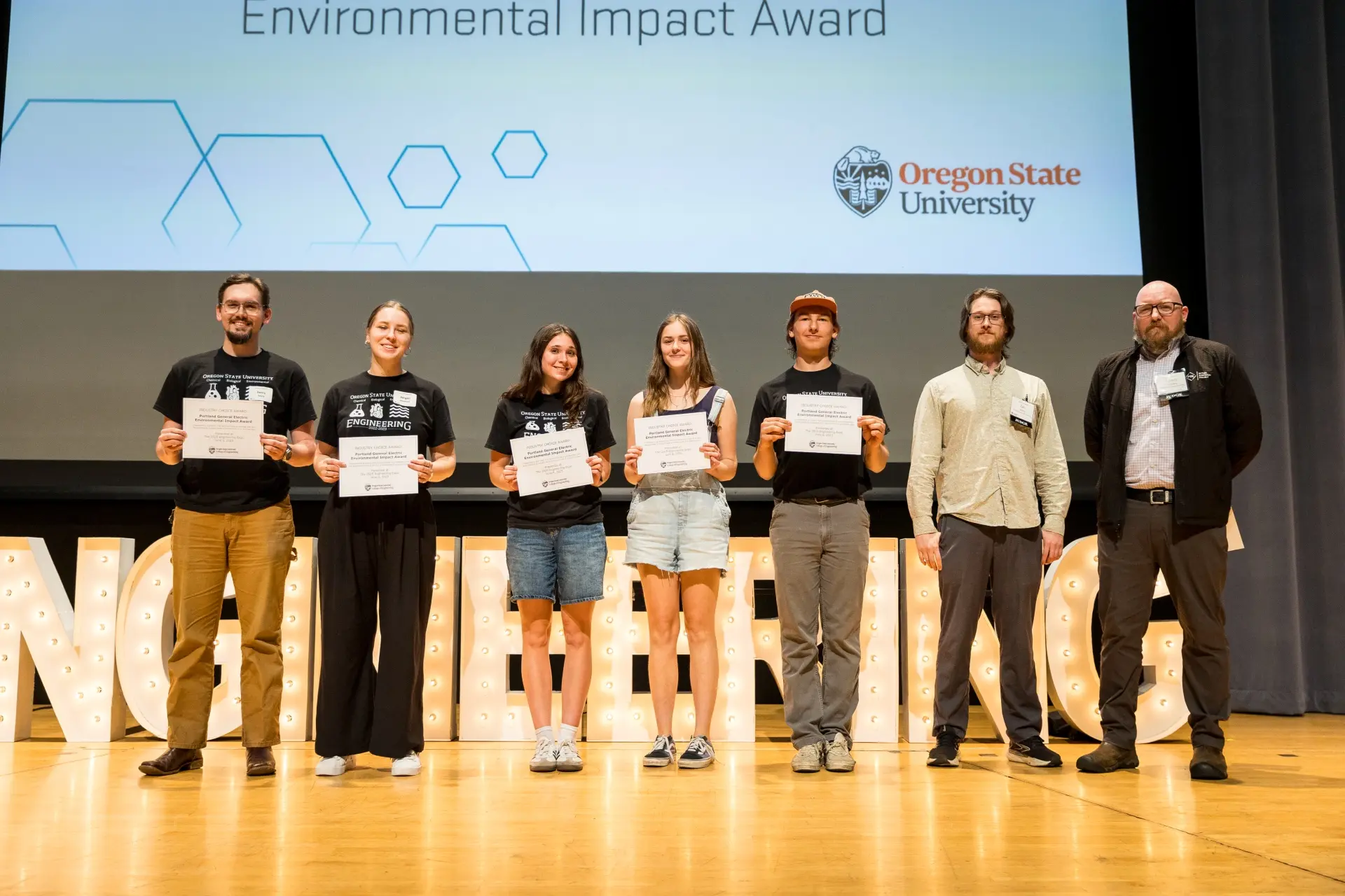 Students accept the 2025 Portland General Electric Environmental Impact Award