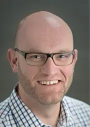 John Baumann.