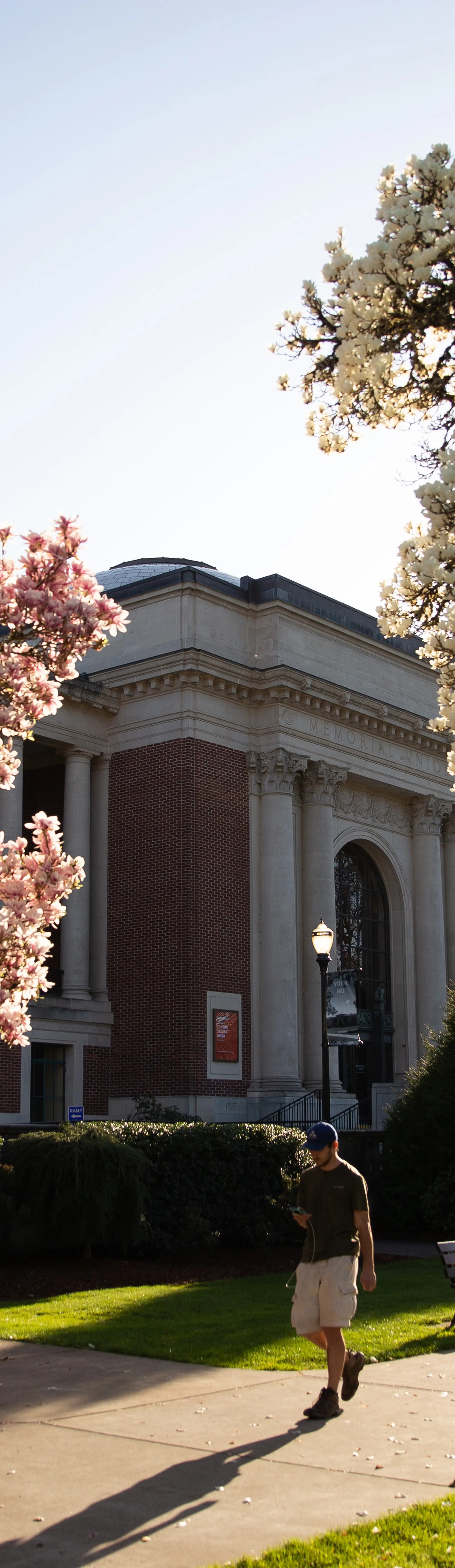 Student walking outside of the Memorial Union