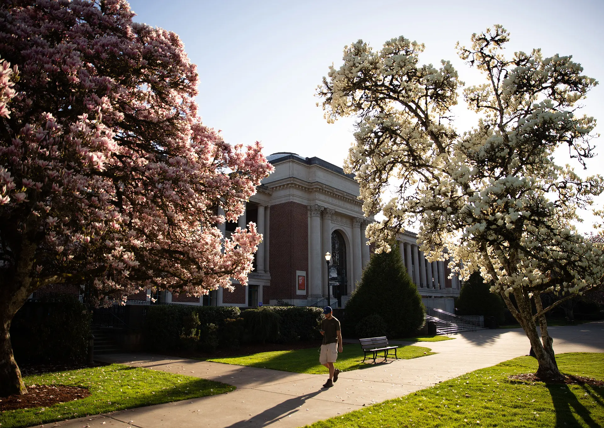 Student walking in front of the Memorial Union.