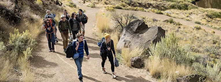 Group of people out on a hike in the desert