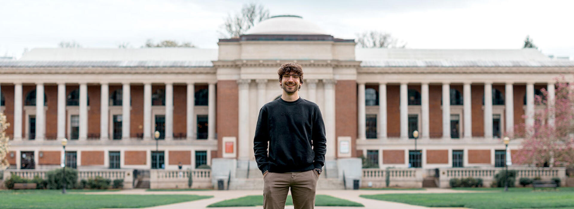Noah Pragin poses in front of the Memorial Union.