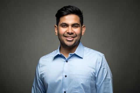 Photo of Abhinav Jain, after grad school speech